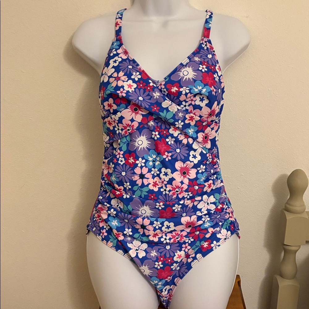 Floral One-Piece Swimsuit so pretty. Adjustable straps. Ties in back.